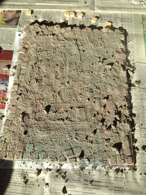 The mosaic covered in my too thick grout. 